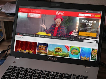 32 Red website on laptop