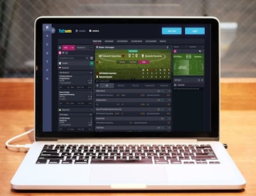 CaspBet homescreen on laptop displaying an in play football match and markets